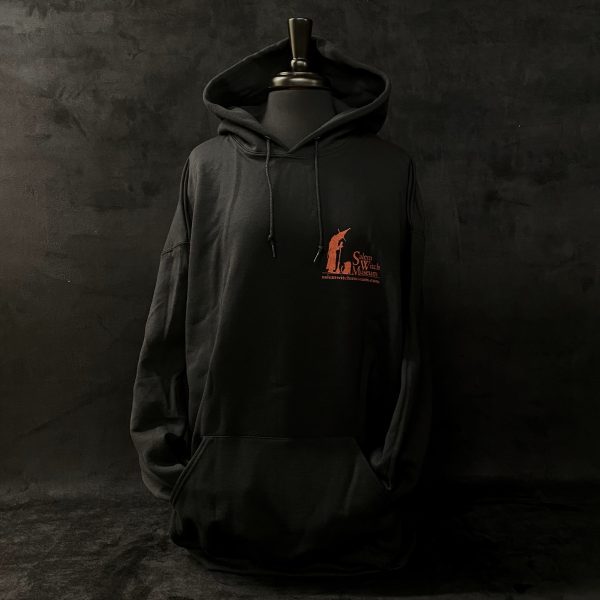 Image of black sweatshirt featuring the Salem Witch Museum logo on the front side. Logo is red.
